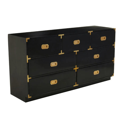 The Sagittarius black mango wood chest with gold finishings has seven drawers.

The black mango wood chest is a decadent addition to you decor. Seven large drawers provide ample storage space, while the gold finishings elevate the chest.

Dimensions; H77 x L43 x W145